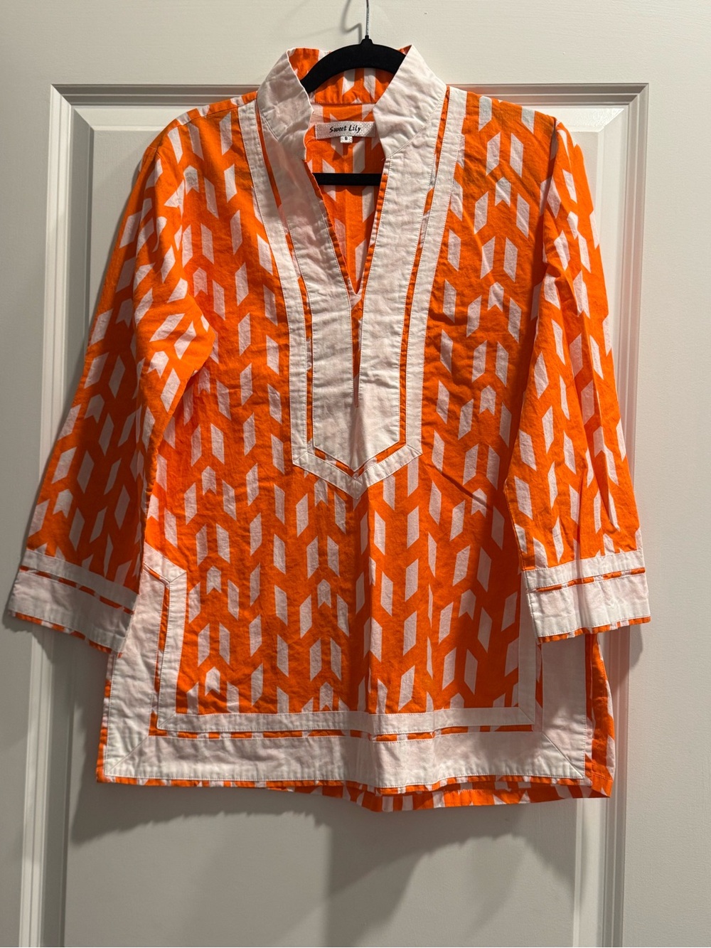 Orange Geometric Split-Neck Tunic with White Trim